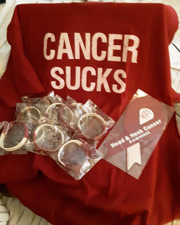 cancer sucks blanket with car magnet and wrist bands in burgundy and white