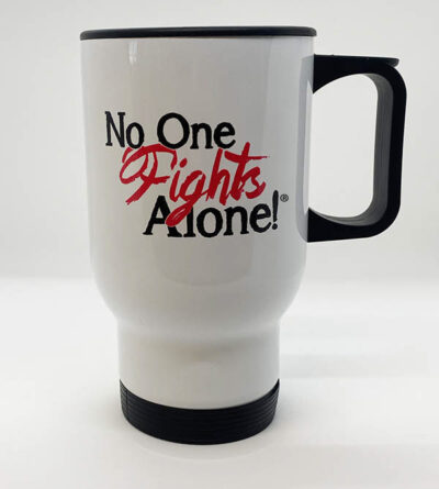 white travel coffee mug with black handle and bottom, with bold black text reading "No One Fights Alone!" with "Fights" being in pretty red text