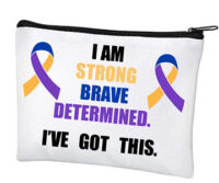 white pencil case with black zipper, text is bold and reads I am strong, brave, determined(peach, blue, purple) I've got this. Two peach, blue and purple ribbons on either side of text