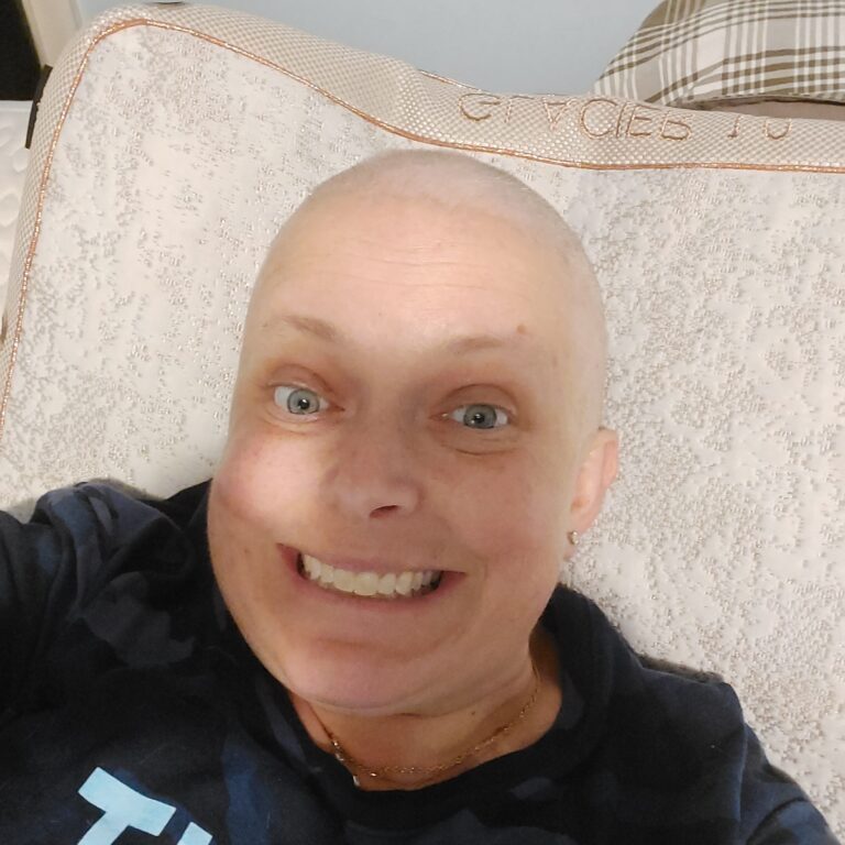 selfie of woman with shaved head