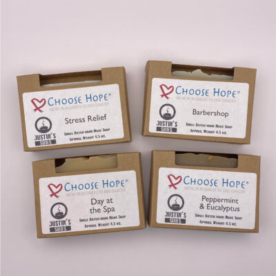 Homemade small batch bar soap. All four scents pictured in packaging with Choose Hope label and scent listed.