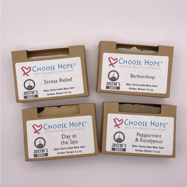 Homemade small batch bar soap. All four scents pictured in packaging with Choose Hope label and scent listed.