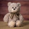 Brown Cancer Awareness Teddy Bear 11 inches tall with a white t-shirt that has the cancer ribbon of your choice printed on the t-shirt that is then placed on the bear.