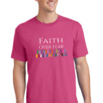 Faith Over Fear T-shirt in pink shirt color, with the wording 'Faith Over Fear' printed on the front of the t-shirt along with all of the cancer awareness ribbons representing all cancers.