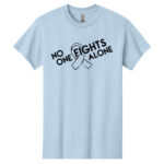No One Fights Alone® Cancer Research T-Shirt shirt color Light Blue with white No One Fights Alone Cancer Awareness ribbon design printed on the t-shirt in black.