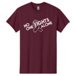 No One Fights Alone® Cancer Research T-Shirt shirt color Maroon with white No One Fights Alone Cancer Awareness ribbon design printed on the t-shirt in white.
