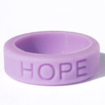 Silicone HOPE ring in Lavender color with the word "HOPE" debossed on the ring.