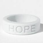 Silicone HOPE ring in White color with the word "HOPE" debossed on the ring.