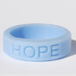 Silicone HOPE ring in Light Blue color with the word "HOPE" debossed on the ring.
