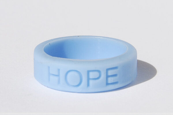 Silicone HOPE ring in Light Blue color with the word "HOPE" debossed on the ring.