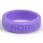 Silicone HOPE ring in Violet color with the word "HOPE" debossed on the ring.