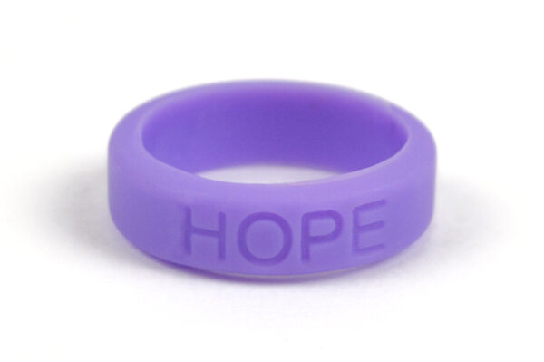 Silicone HOPE ring in Violet color with the word "HOPE" debossed on the ring.