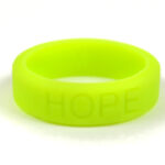 Silicone HOPE ring in Lime color with the word "HOPE" debossed on the ring.