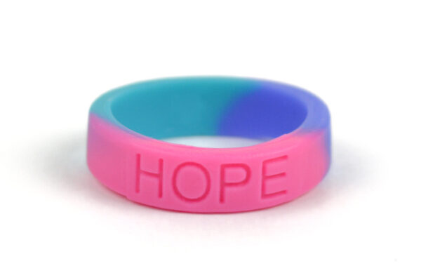 Silicone HOPE ring in Teal, Pink and Blue color with the word "HOPE" debossed on the ring.