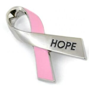 Group Image showing our Hope for a cure ribbon pin which is a silver nickel pin, shaped as a ribbon, with the word 'HOPE' on one side of the ribbon.