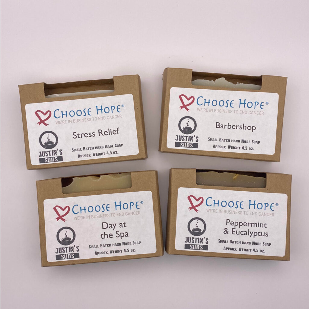 Image shows the four scent options of our Small Batch Homemade Bar Soap. The four scents are Stress Relief, Barbershop, Day At the Spa and Peppermint & Eucalyptus.