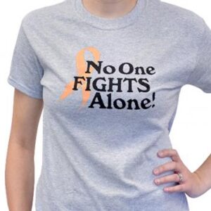 Group image showing our No One Fights Alone® T-shirt that has the wording "No One Fights Alone!" and a cancer awareness ribbon printed on the front of the t-shirt which is a light heather grey color.