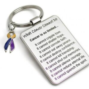 Group Image showing our What Cancer Cannot Do® Keychain with Ribbon Charm which a metal dog tag keychain that has the "What Cancer Cannot Do®" Poem laser engraved onto the keychain, with a cancer awareness ribbon charm in the color of your choice hooked onto the key ring of the keychain.