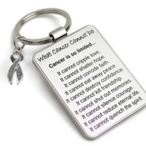 Group Image showing our What Cancer Cannot Do® Keychain with Ribbon Charm which a metal dog tag keychain that has the "What Cancer Cannot Do®" Poem laser engraved onto the keychain, with a cancer awareness ribbon charm in the color of your choice hooked onto the key ring of the keychain.
