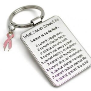 Group Image showing our What Cancer Cannot Do® Keychain with Ribbon Charm which a metal dog tag keychain that has the "What Cancer Cannot Do®" Poem laser engraved onto the keychain, with a cancer awareness ribbon charm in the color of your choice hooked onto the key ring of the keychain.