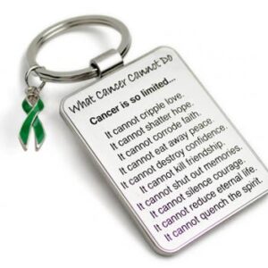Group Image showing our What Cancer Cannot Do® Keychain with Ribbon Charm which a metal dog tag keychain that has the "What Cancer Cannot Do®" Poem laser engraved onto the keychain, with a cancer awareness ribbon charm in the color of your choice hooked onto the key ring of the keychain.