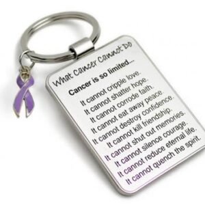 Group Image showing our What Cancer Cannot Do® Keychain with Ribbon Charm which a metal dog tag keychain that has the "What Cancer Cannot Do®" Poem laser engraved onto the keychain, with a cancer awareness ribbon charm in the color of your choice hooked onto the key ring of the keychain.