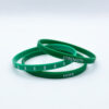 Image shows our Kelly green inspirational mini wristbands representing Gallbladder and bile duct cancer awareness.