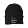Image showing our Choose Hope Knit Beanie in Black, with the white and Red Choose Hope logo embroidered on the front of the beanie